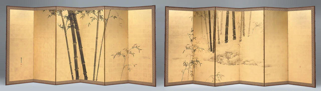 Two gold six-panel folding screens show tall bamboo stalks and leaves around broad open areas, rocks, and a narrow stream.