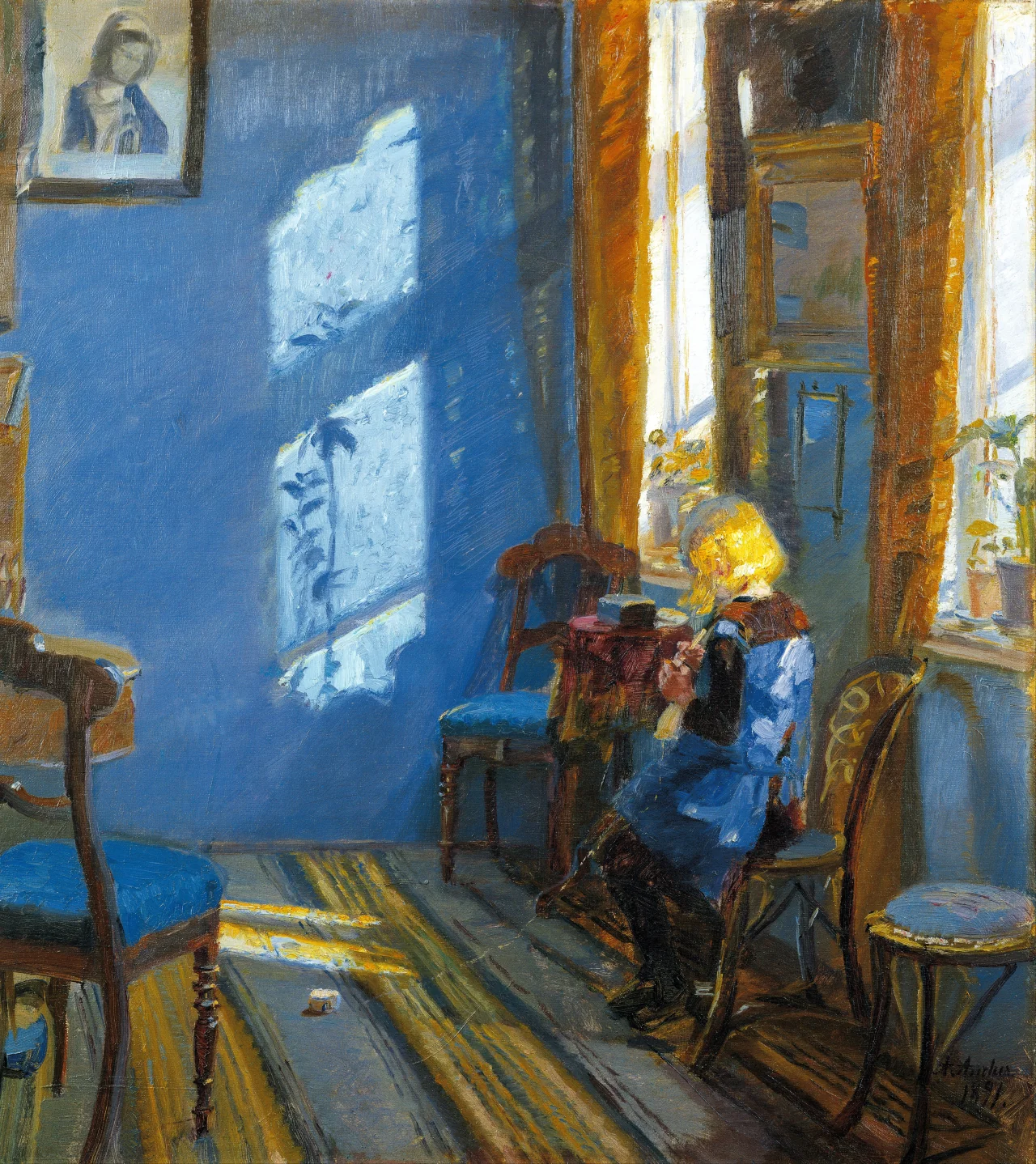 A girl crocheting beside a window as sunlight forms bright shapes across a blue wall and striped rug