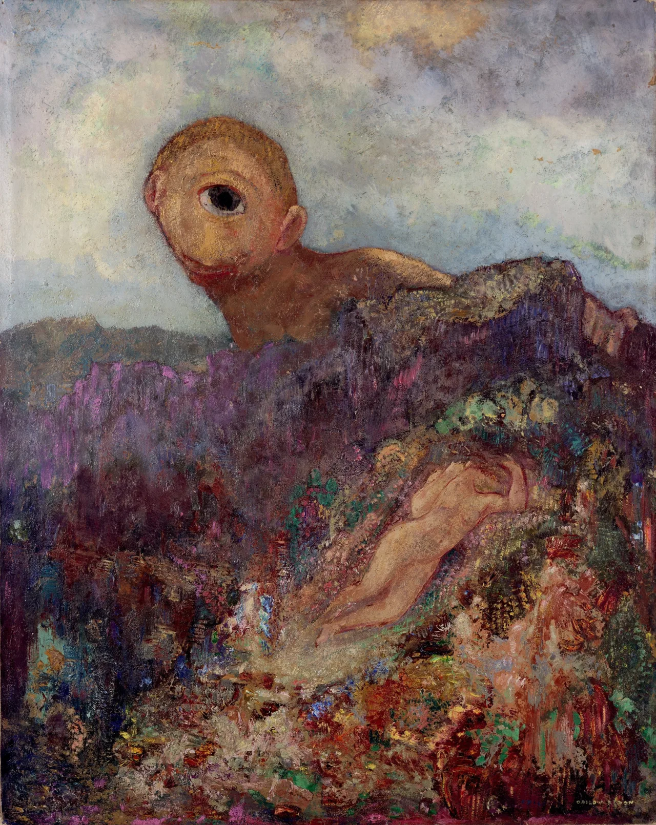 A one-eyed giant watches a sleeping nude figure from behind a rocky ridge